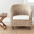 Fauteuil en rotin avec coussin
